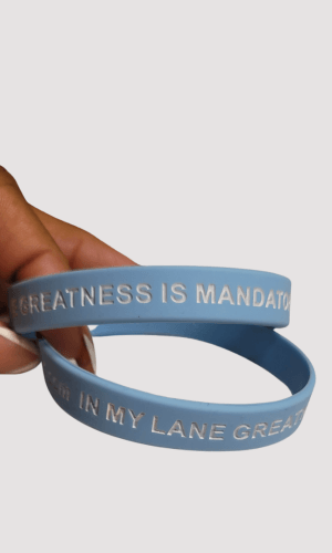 Duffle Bag Greatness affirmation bracelet promoting uniqueness and self-empowerment.